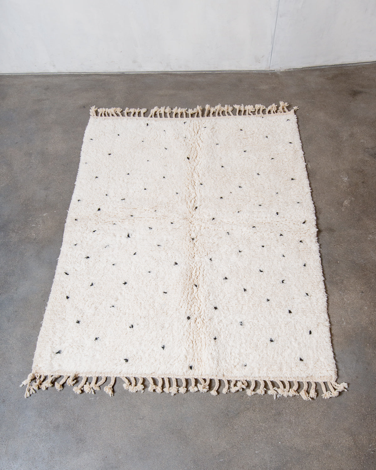 Modern, designer, handcrafted Berber rug from Morocco. Beniourain carpet with beautiful colours and patterns and fluffy wool texture.